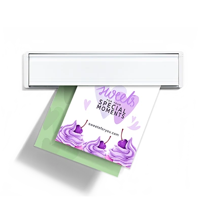 Beautiful bright and vibrant full-color postcards being delivered through a mail slot